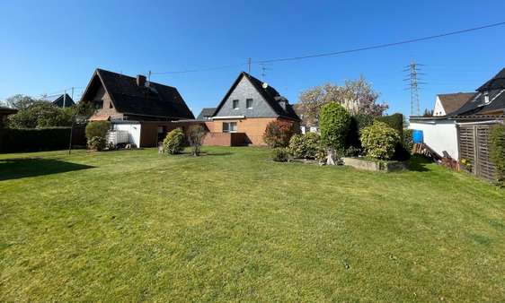 Rückansicht - Einfamilienhaus in 50997 Köln - Godorf mit 80m² kaufen