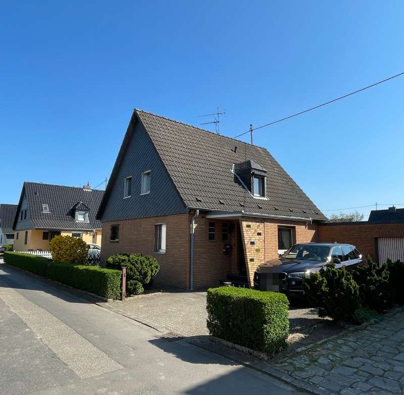 Ansicht - Einfamilienhaus in 50997 Köln - Godorf mit 80m² kaufen