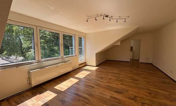 Wohnzimmer Wohnzimmer - Dachgeschosswohnung in 51145 Köln mit 63m² kaufen