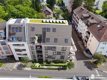 Visu Vogelperspektive Straßenseite Sommer - Etagenwohnung in 53225 Bonn mit 107m² kaufen
