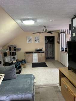 Wohnzimmer Wohnzimmer - Dachgeschosswohnung in 50127 Bergheim mit 55m² als Kapitalanlage kaufen