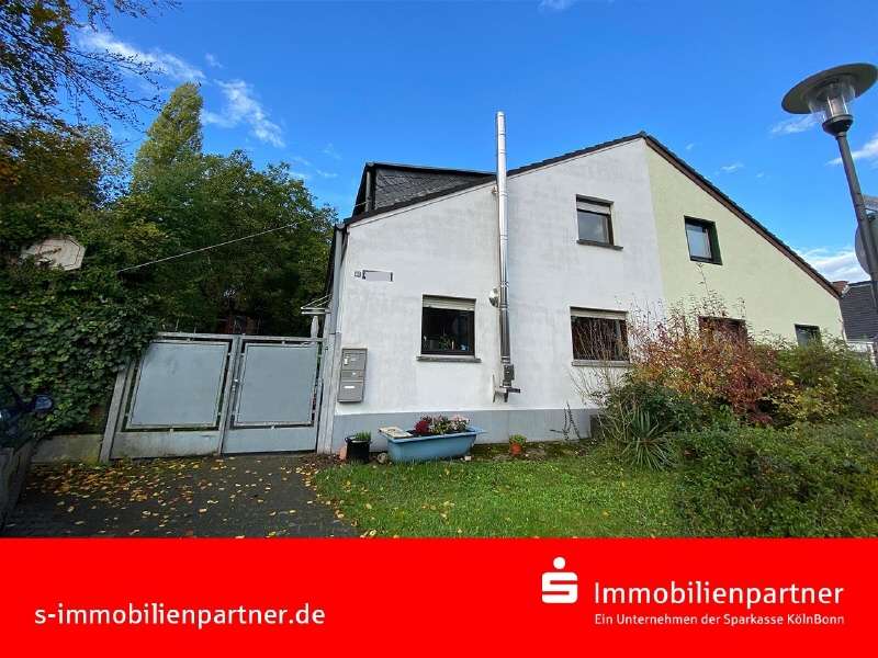 Vorderansicht - Doppelhaushälfte in 50829 Vogelsang mit 156m² günstig kaufen
