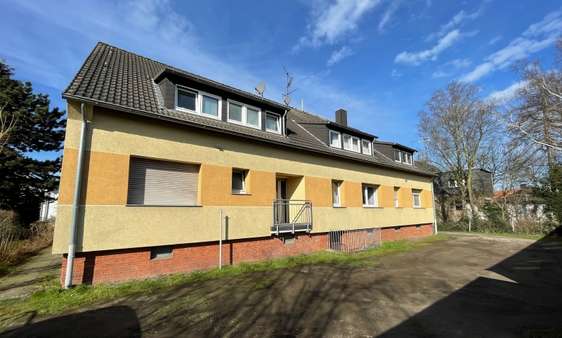 Rückansicht - Mehrfamilienhaus in 47259 Duisburg - Mündelheim mit 369m² als Kapitalanlage kaufen