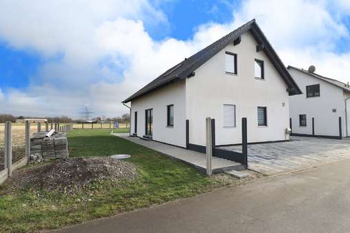 Seitenansicht - Einfamilienhaus in 52525 Heinsberg mit 150m² günstig kaufen