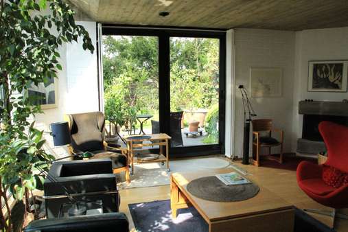 Wohnbereich mit Kamin - Einfamilienhaus in 52525 Heinsberg mit 116m² kaufen