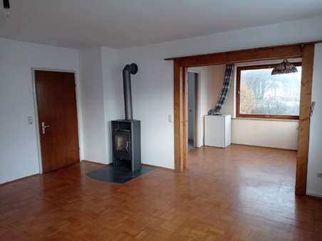 EG Wohnzimmer mit Schwedenofen - Mehrfamilienhaus in 88410 Bad Wurzach mit 237m² kaufen
