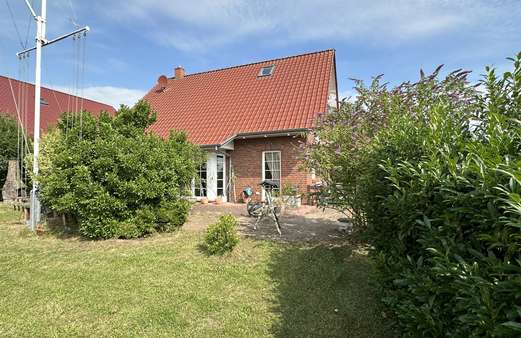 Blick vom Garten auf die Terrasse - Einfamilienhaus in 21279 Hollenstedt mit 133m² kaufen