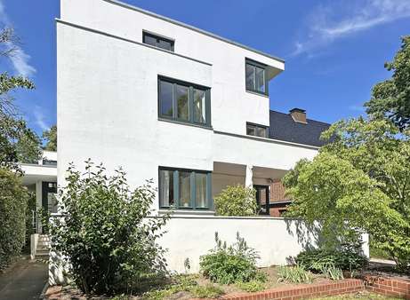 Seitenansicht Seitenansicht - Einfamilienhaus in 22587 Hamburg mit 310m² kaufen