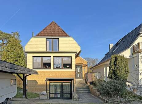 Vorderansicht - Einfamilienhaus in 24558 Henstedt-Ulzburg mit 89m² kaufen