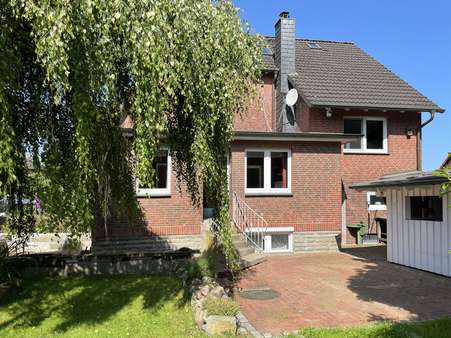 Gebäuderückansicht - Einfamilienhaus in 21224 Rosengarten mit 122m² kaufen