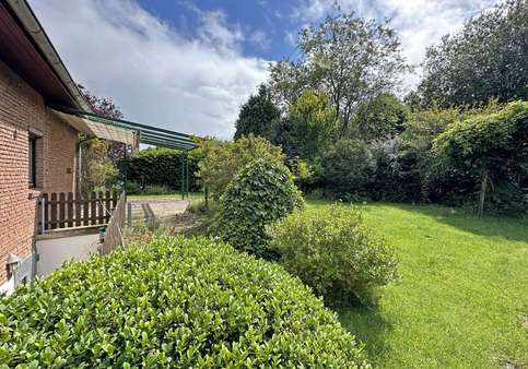 Garten mit Terrasse (2) - Doppelhaushälfte in 24610 Trappenkamp mit 151m² kaufen