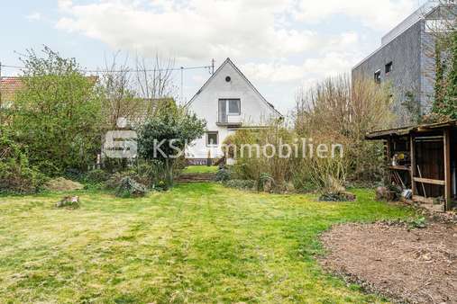 Rückansicht  - Einfamilienhaus in 50765 Köln / Esch/Auweiler mit 113m² kaufen