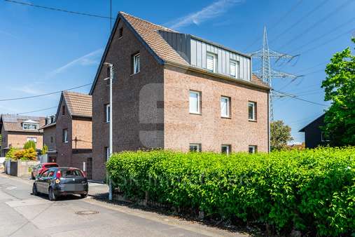 Außenansicht  - Mehrfamilienhaus in 53332 Bornheim mit 218m² kaufen