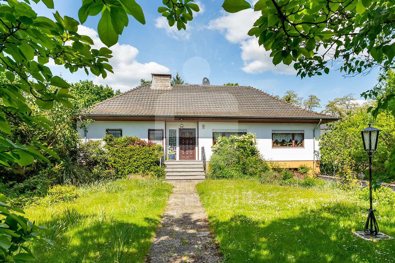 Außenansicht - Einfamilienhaus in 51503 Rösrath / Stümpen mit 131m² kaufen