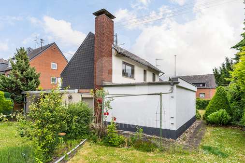 Rückansicht - Einfamilienhaus in 50997 Köln / Meschenich mit 103m² kaufen
