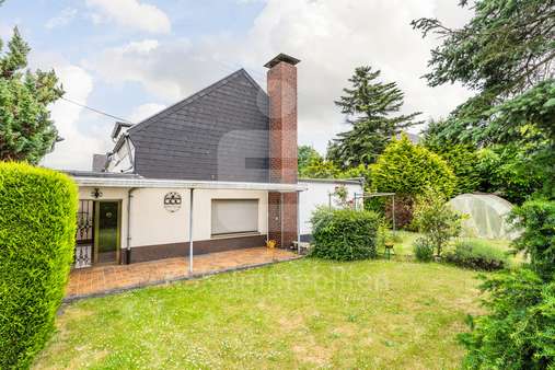 Rückansicht  - Einfamilienhaus in 50997 Köln / Meschenich mit 103m² kaufen