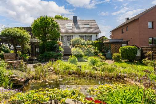 Rückansicht  - Einfamilienhaus in 50170 Kerpen mit 77m² kaufen