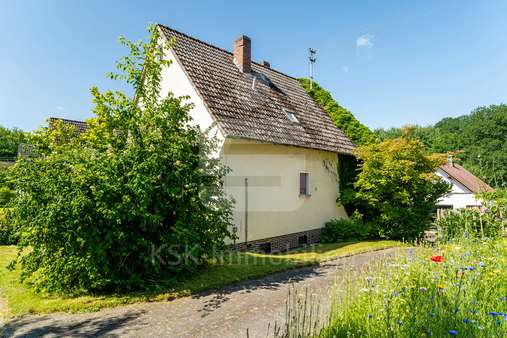 Seitenansicht Seitenansicht - Zweifamilienhaus in 51570 Windeck mit 97m² kaufen