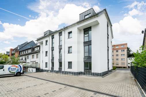 Rückansicht - Erdgeschosswohnung in 53842 Troisdorf / Spich mit 86m² kaufen