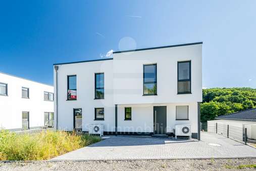 Außenansicht - Doppelhaushälfte in 51570 Windeck mit 149m² kaufen