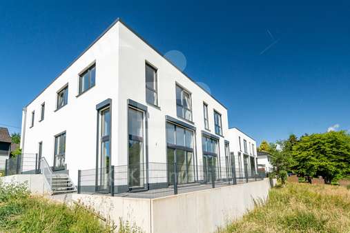 Außenansicht - Doppelhaushälfte in 51570 Windeck mit 149m² kaufen
