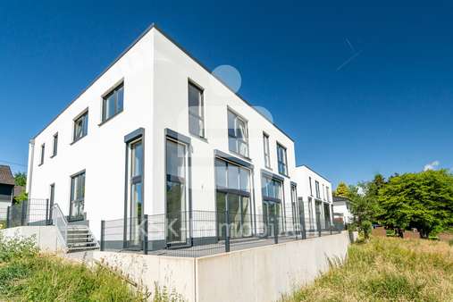 Rückansicht Rückansicht - Doppelhaushälfte in 51570 Windeck mit 149m² kaufen