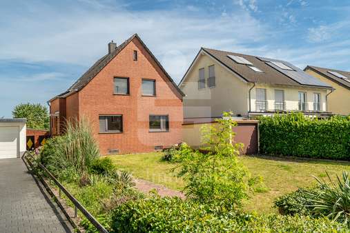 Aussenansicht  - Einfamilienhaus in 53757 Sankt Augustin / Menden (Rheinland) mit 105m² kaufen
