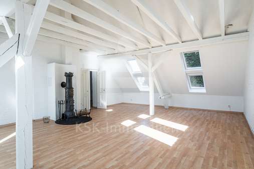 Wohnzimmer Wohnzimmer - Dachgeschosswohnung in 50769 Köln / Worringen mit 117m² kaufen