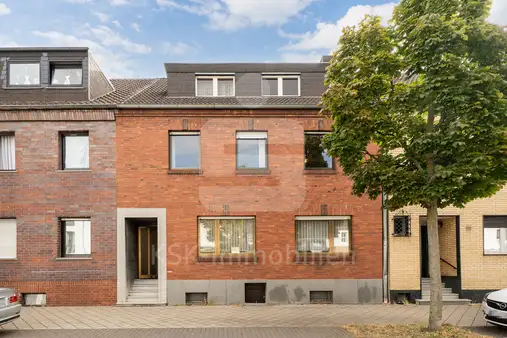 Mehrgenerationenhaus mit Potential - Wohnen & Rendite unter einem Dach.