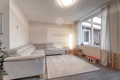 Wohnzimmer - Doppelhaushälfte in 53332 Bornheim mit 122m² kaufen