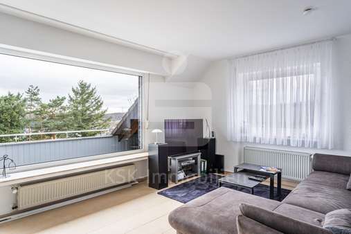 Wohnzimmer  - Dachgeschosswohnung in 51491 Overath mit 63m² kaufen