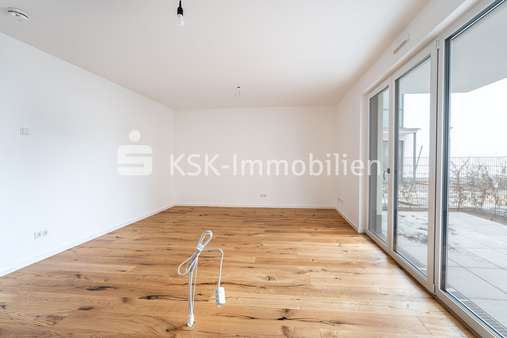 Wohnzimmer - Erdgeschosswohnung in 51503 Rösrath mit 68m² kaufen