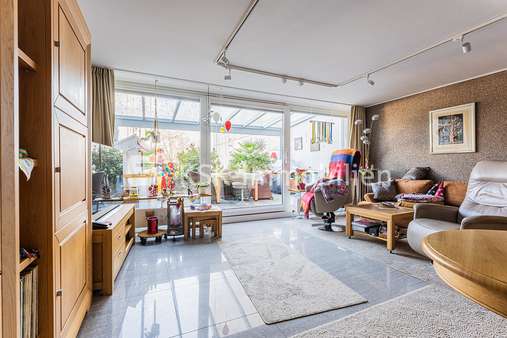 112836 Wohnzimmer Erdgeschoss - Maisonette-Wohnung in 50321 Brühl mit 120m² günstig kaufen