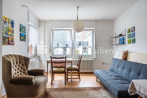 117233 Wohnzimmer Erdgeschoss - Einfamilienhaus in 50997 Köln mit 125m² kaufen