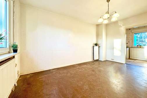 Wohnzimmer / offener Küchenbereich - Reiheneckhaus in 44879 Bochum mit 58m² kaufen